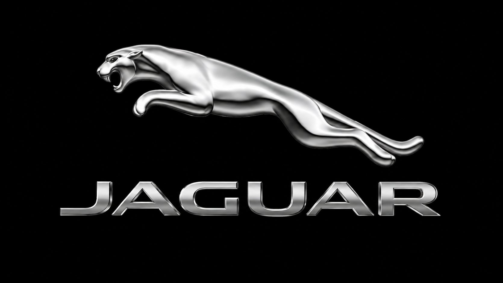 Logo Jaguar chromé avec félin bondissant sur fond noir
